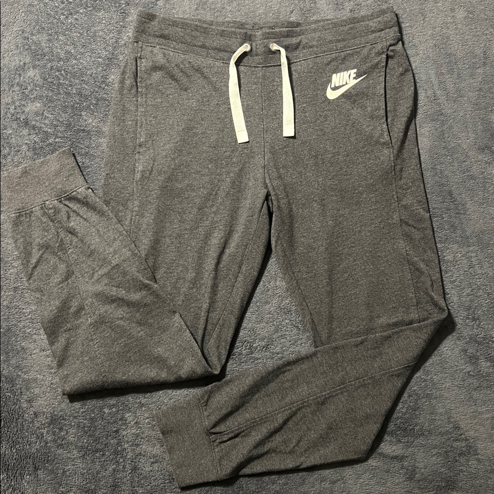 Nike gray joggers women’s medium tie waist deep pockets athletic gym casual wear